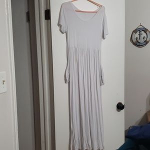 Long spandexy white dress with pockets.
